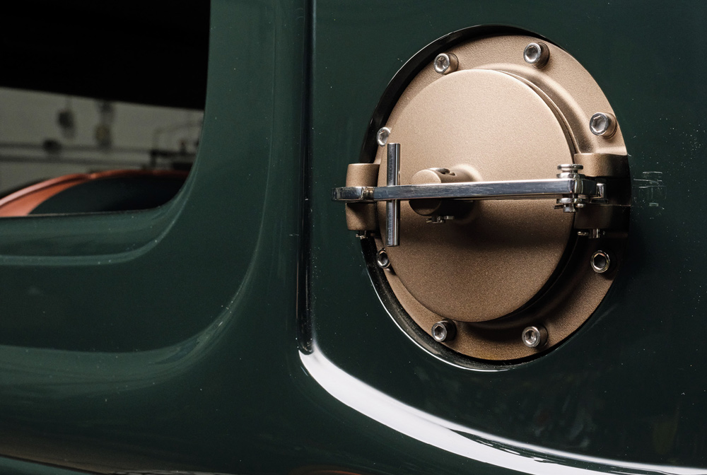 close up of a gas tank on a green ’30 Ford