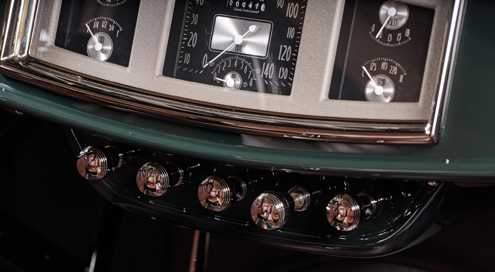 close up of a radio in a green ’30 Ford