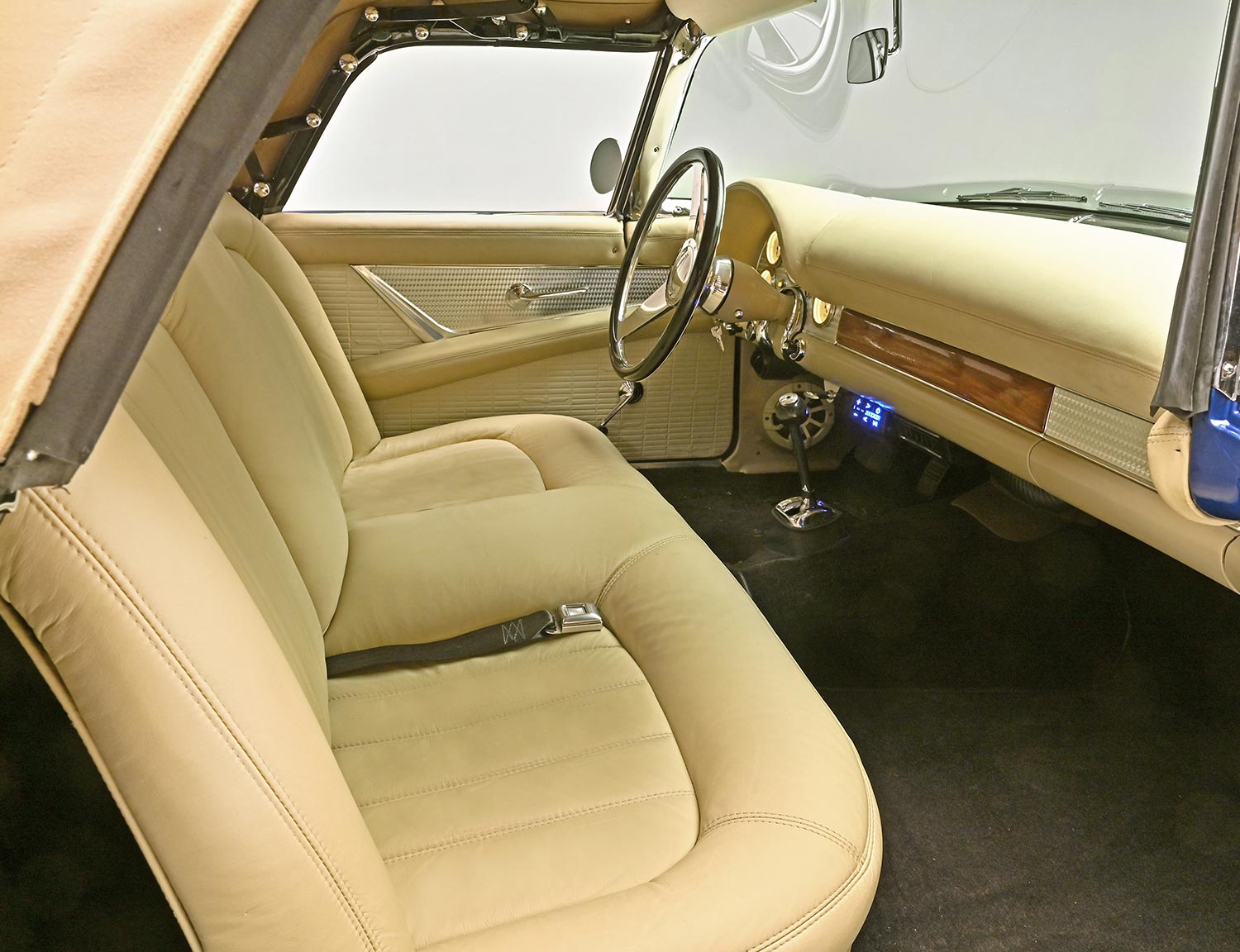 view through the open passenger door of the ’55 Thunderbird convertible's seating