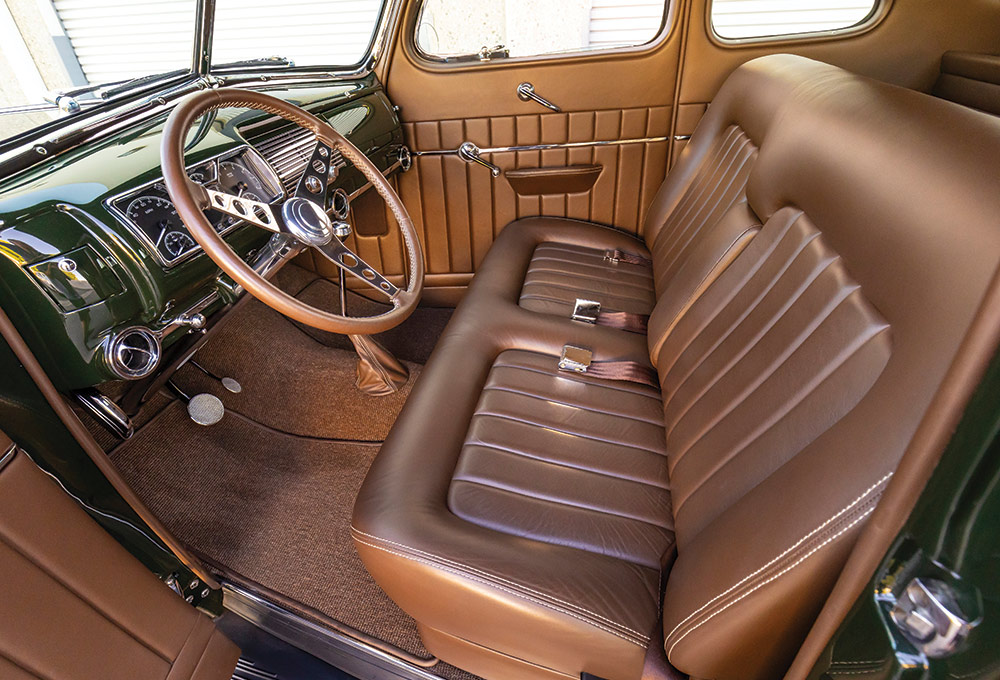 View of coupe's saddle brown leather interior