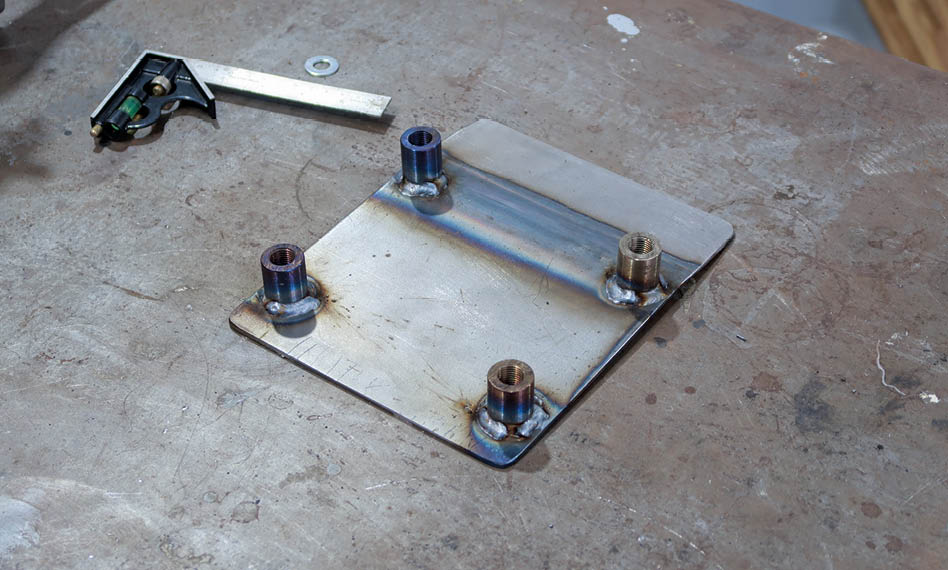 With the threaded standoffs welded in place the second plate, which the pedal assembly will attach to, will be welded to the reinforcement on the firewall.