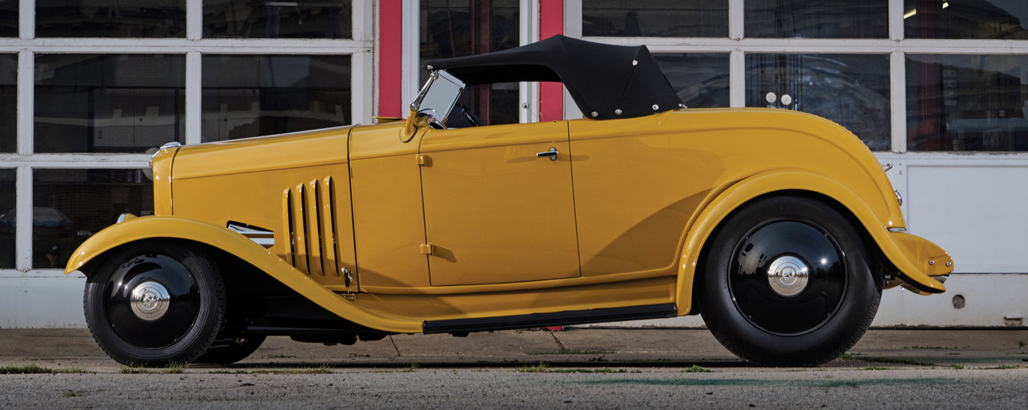 passenger side of a yellow ’32 Ford