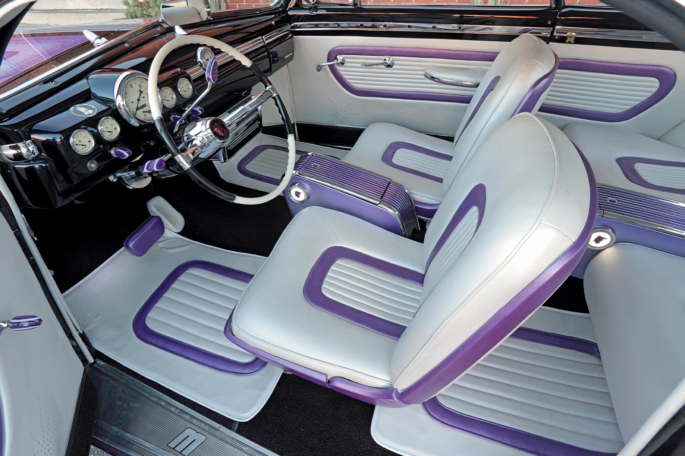 high angle interior view of the custom ’51 Mercury with a focus on the driver and front passenger seating
