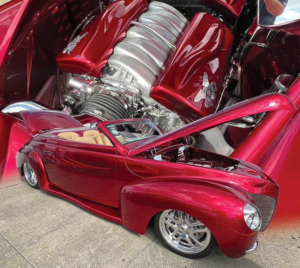 Metallic red custom '40 Mercury convertible and its 427 LS7 with paint matched custom valve covers