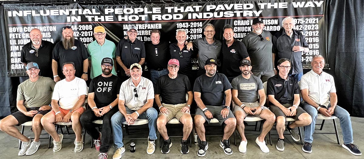 Jim and Will Posey (Big Oak Garage), Ken Fenical (Posies), Gary Case (promoter), Chip Foose (Foose Design), Bobby Alloway (promoter), Troy Trepanier (Rad Rides by Troy), Dave Kindig (Kindig It Design), Jason and Jerry Slover (Pete & Jakes). Starting left on the seated row: Kyle Tucker (Detroit Speed), Alan Johnson (Johnson’s Hot Rods), Jesse Greening (Greening Auto Company), Mike Ring (Ringbrothers), Roy Brizio (Roy Brizio Street Rods), Phil and Jeremy Gerber (Roadster Shop), Jonathan Goolsby (Goolsby Customs), and Jim Ring (Ringbrothers)