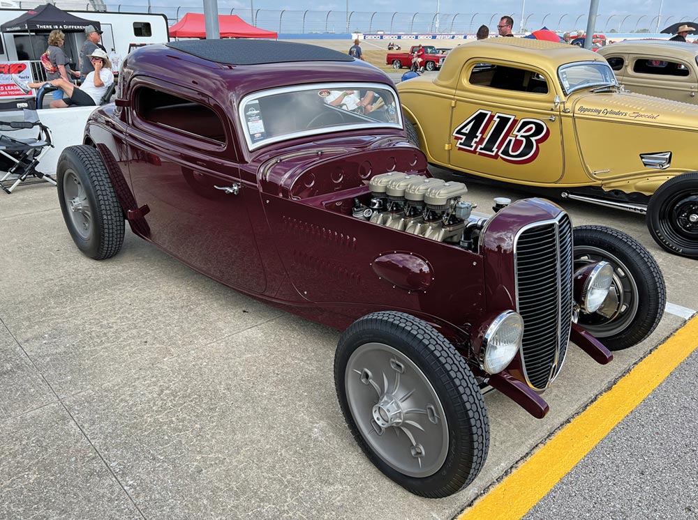 Burgundy '33 Ford coupe with hood delete