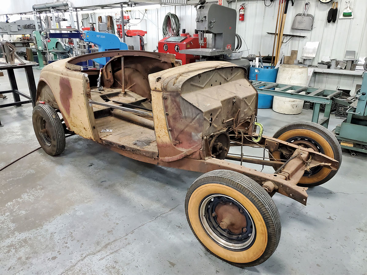Bare rusty frame from a ford roadster