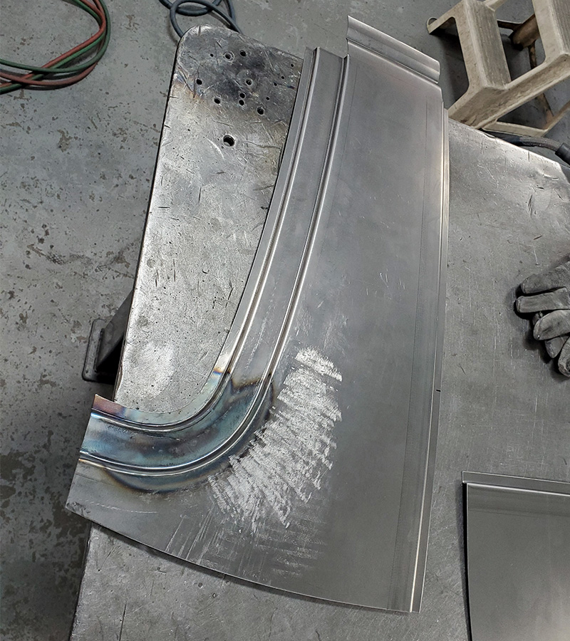 Cowl being shaped on a table
