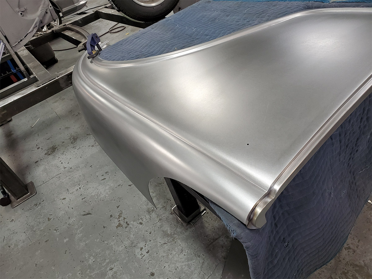 driver side quarter-panel laying on table