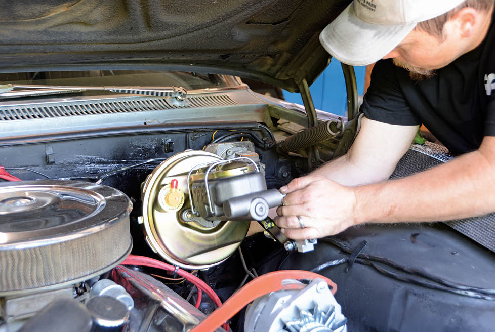 We’re using CPP’s firewall-mounted booster and dual master cylinder combo (PN 5864BB24). This kit installs easily, using the existing hardware on the firewall.