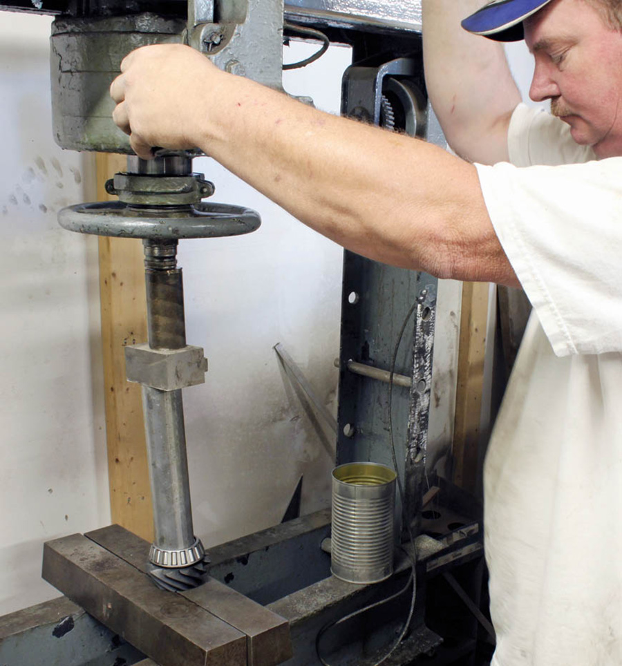 Here, Dan Cook simply presses the rear pinion bearing onto the pinion shaft. If performing this project at home, a length of bar stock long enough to cover the pinion shaft will be needed for accurate installation. 