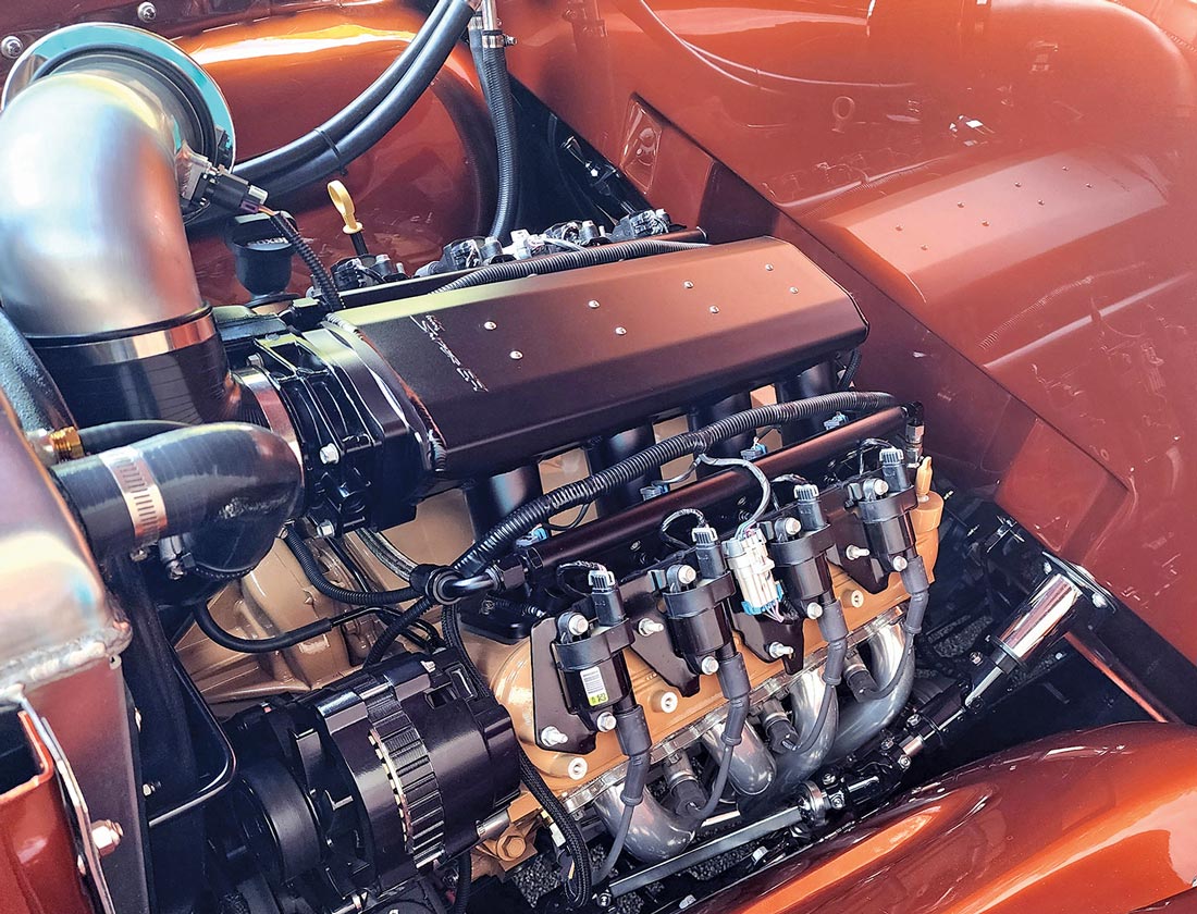 the rusty orange ’50 Chevy Pickup's engine
