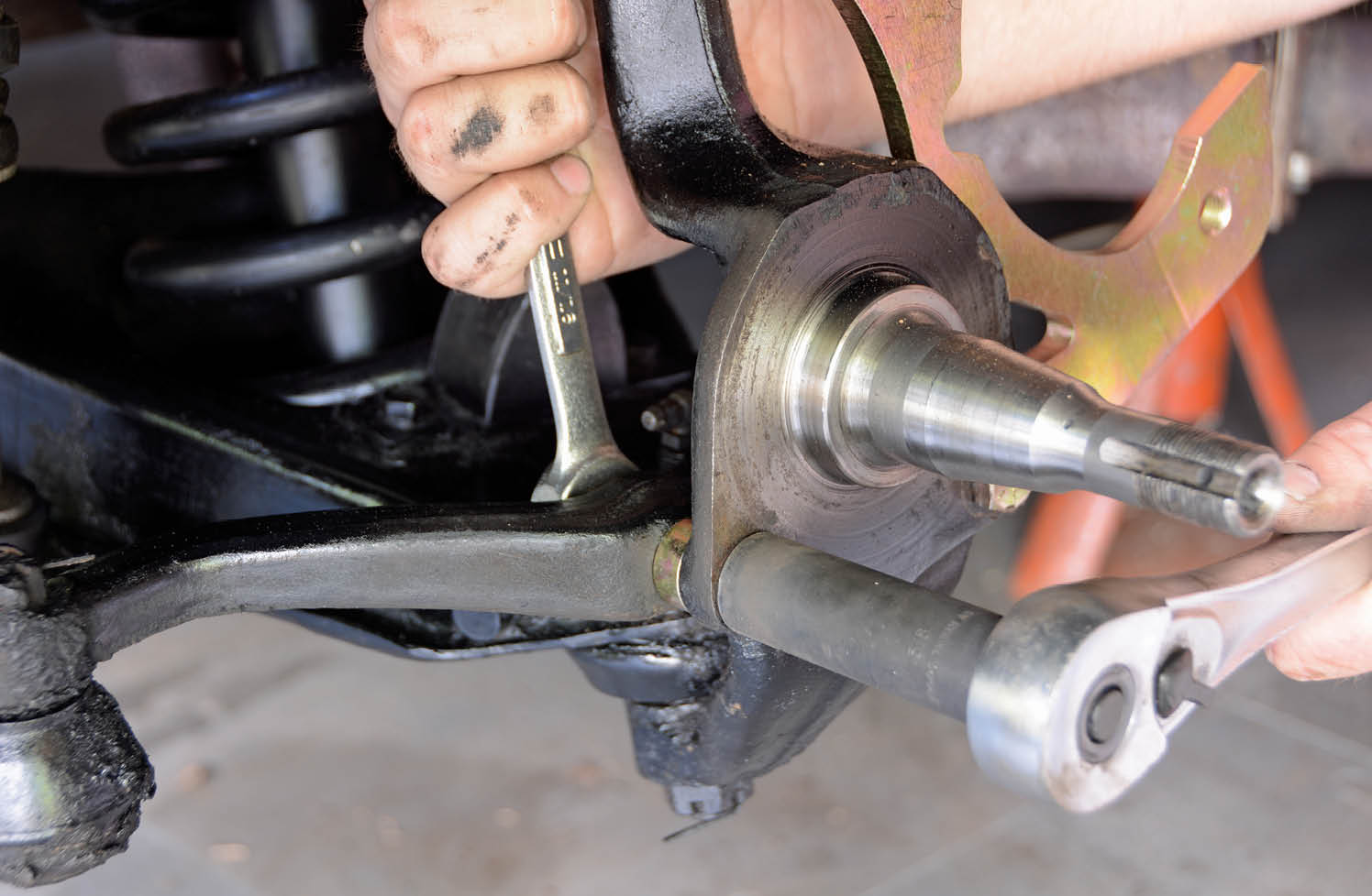 Hardware is also provided for the lower portion of the spindle. The caliper bracket sits between the spindle and steering arm, so a spacer is used on the front bolt to retain proper steering geometry.