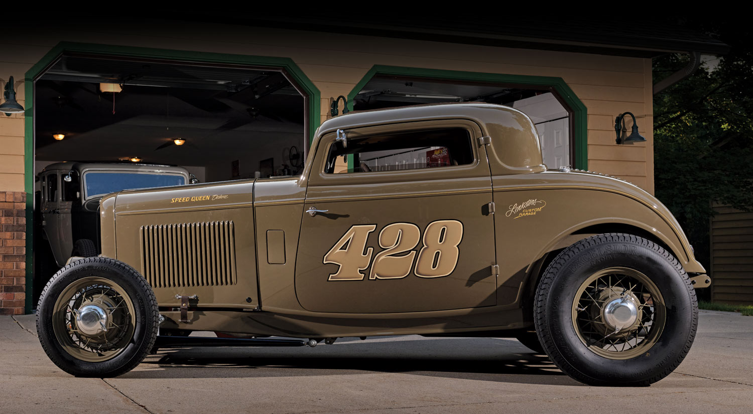 drivers side of a brown ’32 Ford with the number 428 on the side