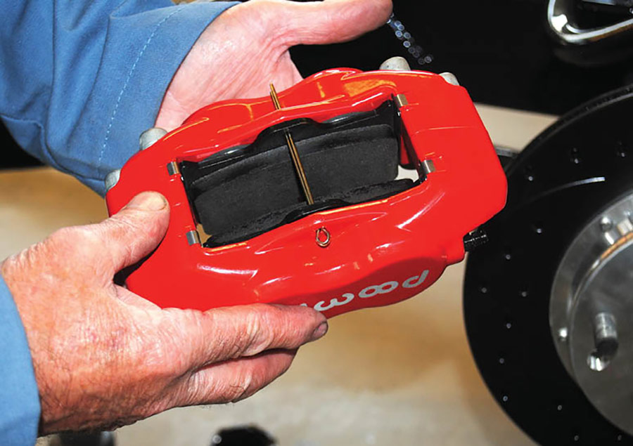 Installing brake pads in a Dynalite caliper is simple. They drop in place and are then secured with a long cotter pin.