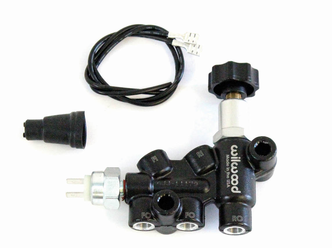 To balance the front to the rear brake bias a Wilwood adjustable proportioning valve was plumbed into the system. Included with the valve is a hydraulic stoplight switch.