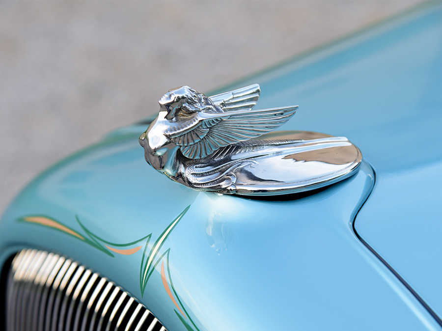 closeup of ornament on front hood of '32 Plymouth PB Coupe