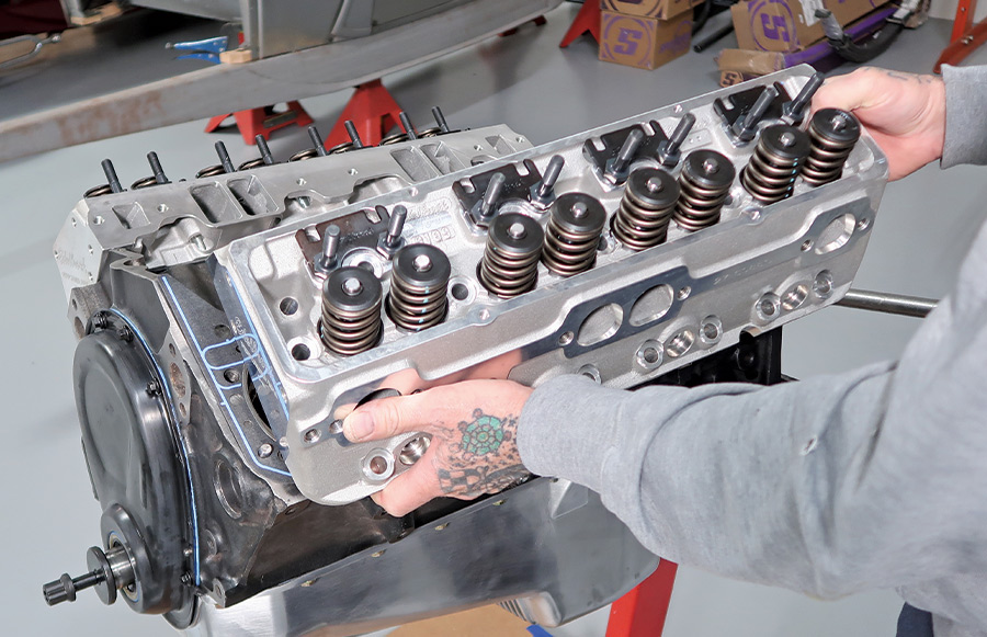 pair of 64cc chamber Edelbrock Performer RPM aluminum cylinder heads being used to raise the compression ratio
