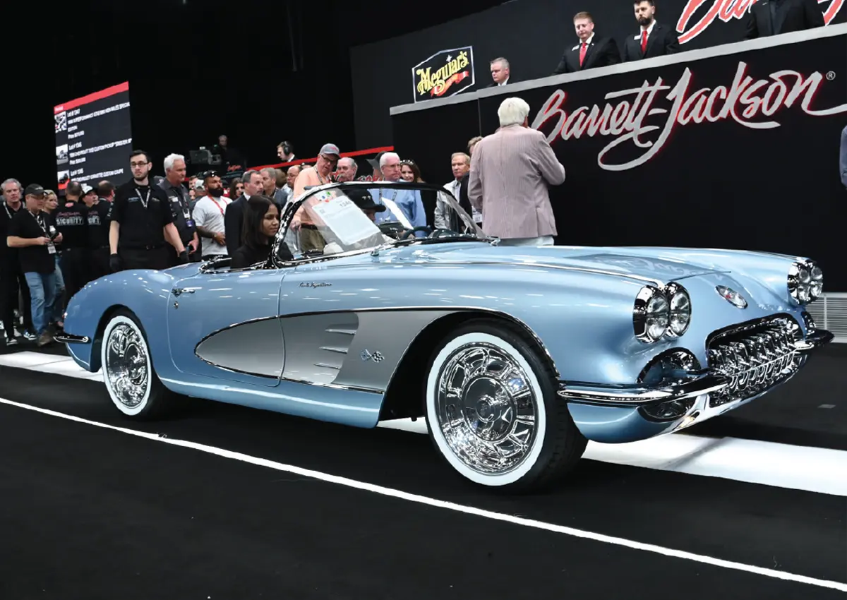 front passenger side of a powder blue custom ’58 convertible