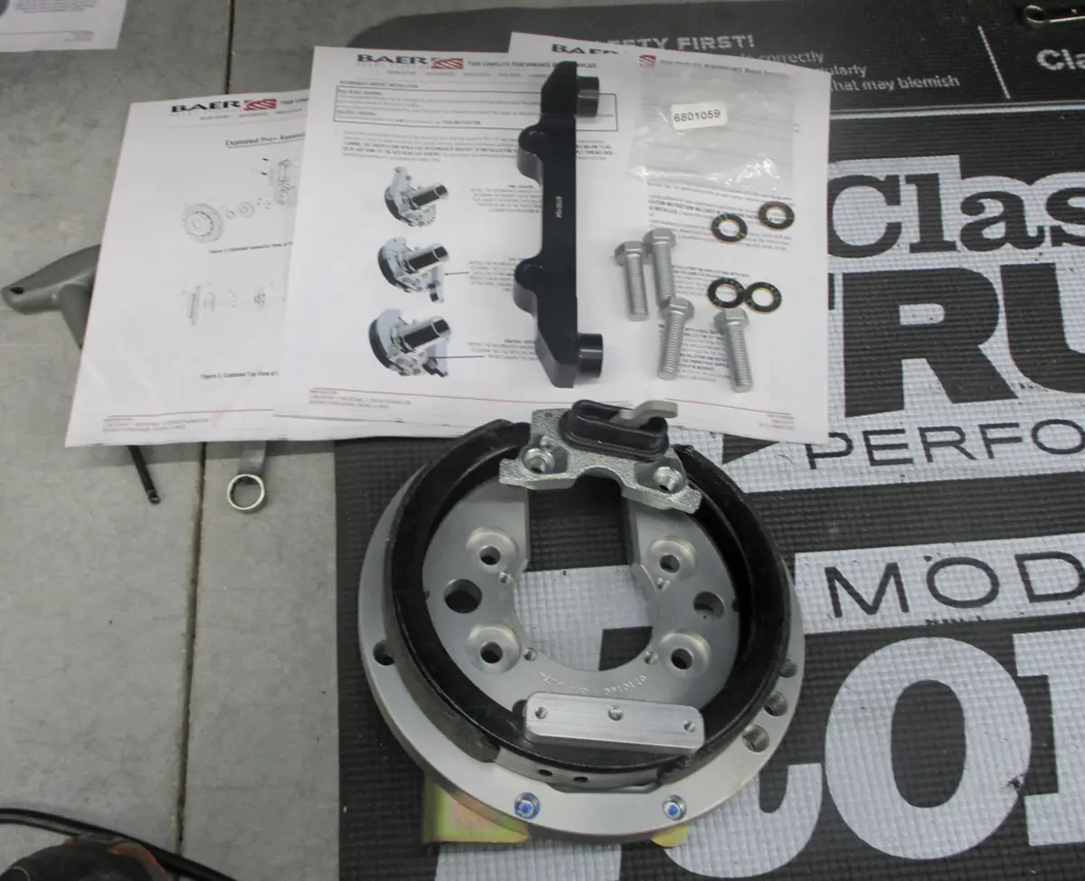 top view of the Banksia mechanical parking brakes beside the included instructions