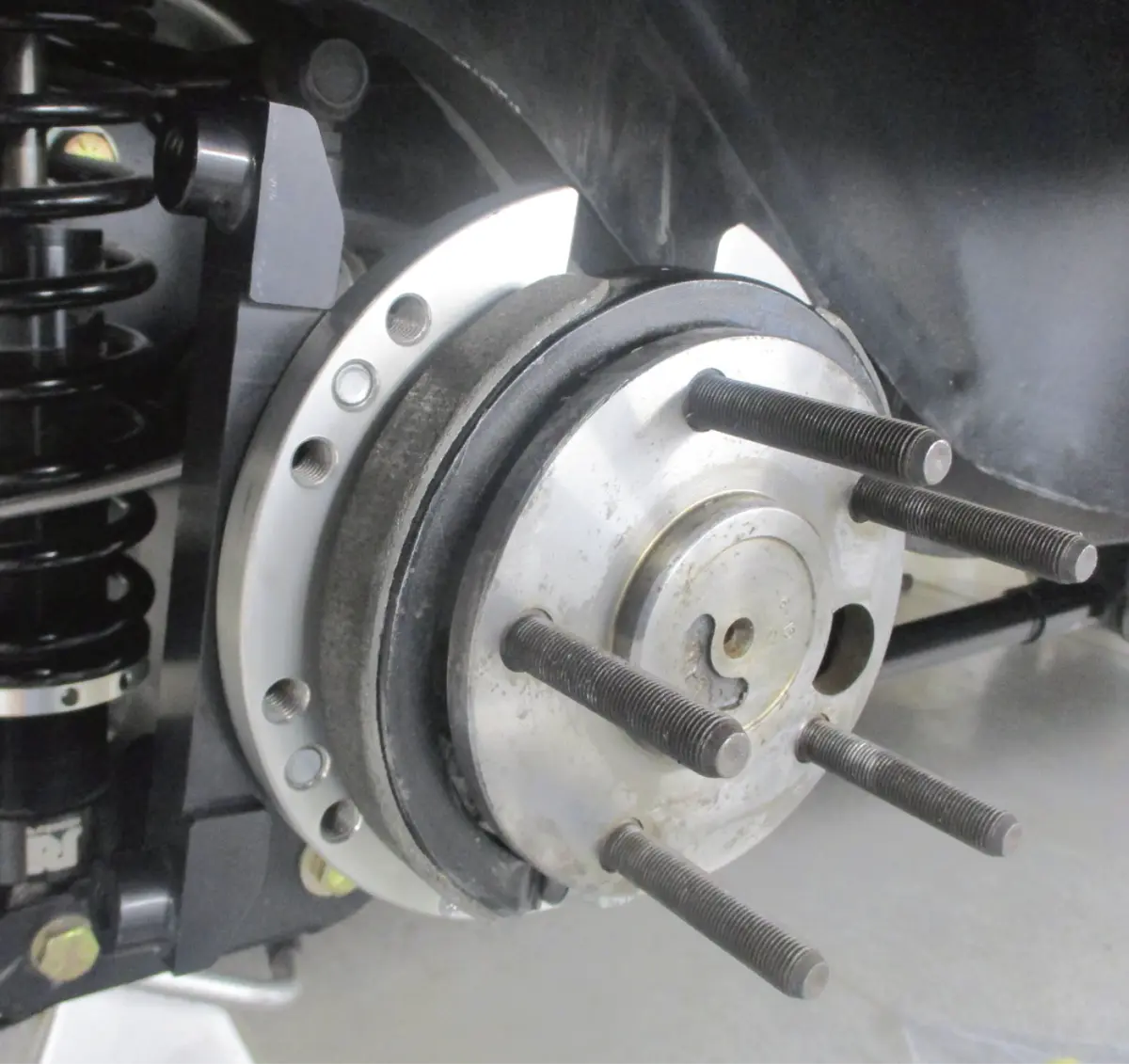 the parking brake bracket installed on the wheel hub