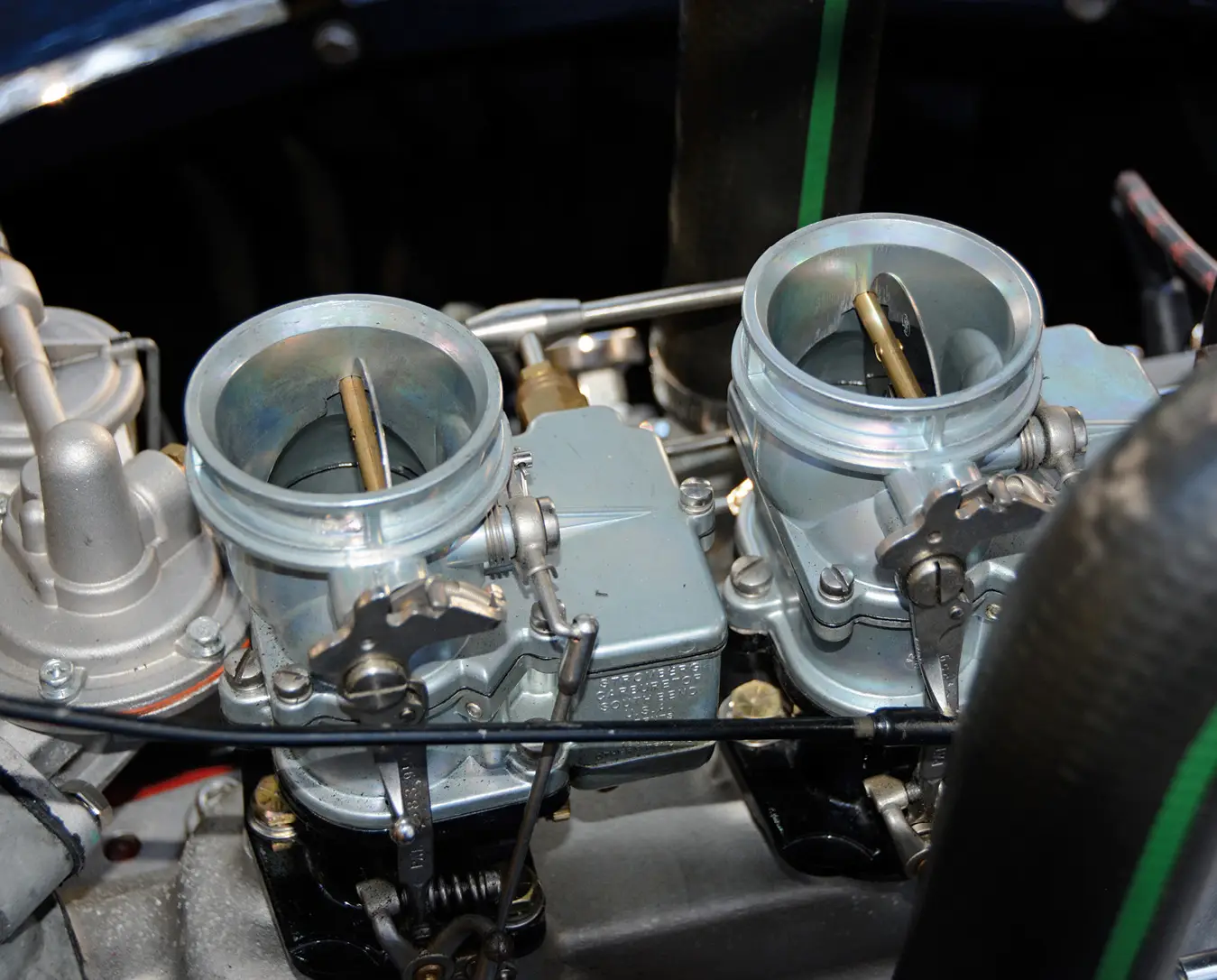 With all linkages removed from the carburetors, both Strombergs should now be fully closed with choke blades wide open.