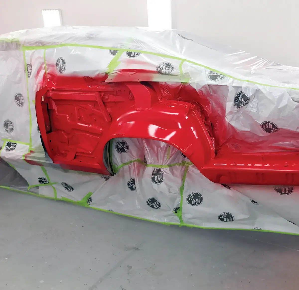 a large section of the ’69 Charger body is taped off for repair