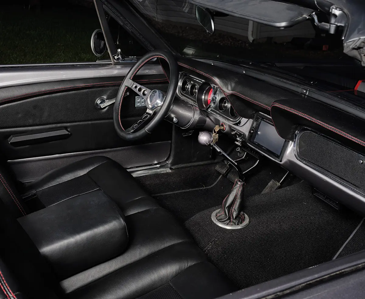 driver and passenger seat view of '66 Ford Mustang convertible