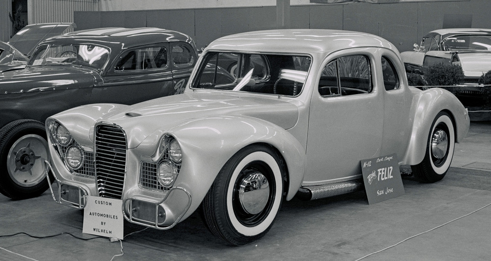 old black and white photograph of a custom silver ’36 Ford five-window