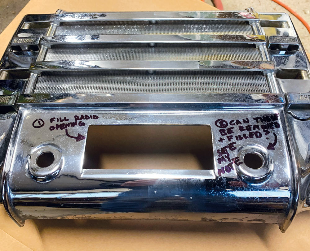 handwritten notes on chrome speaker grille