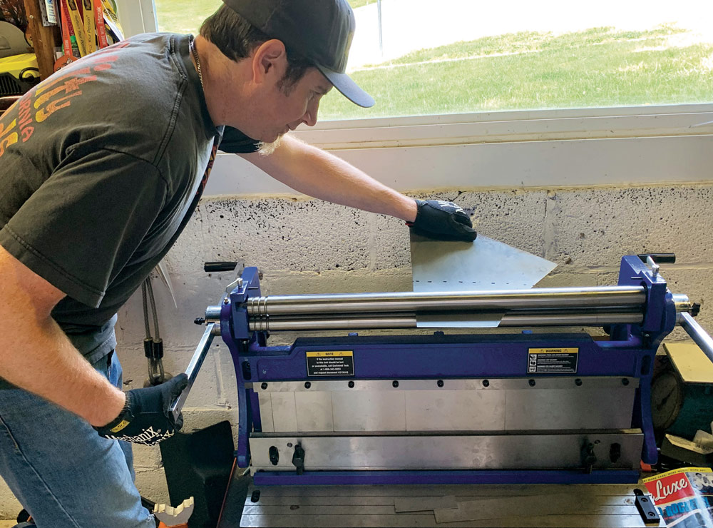 panel being shaped on a slip roll