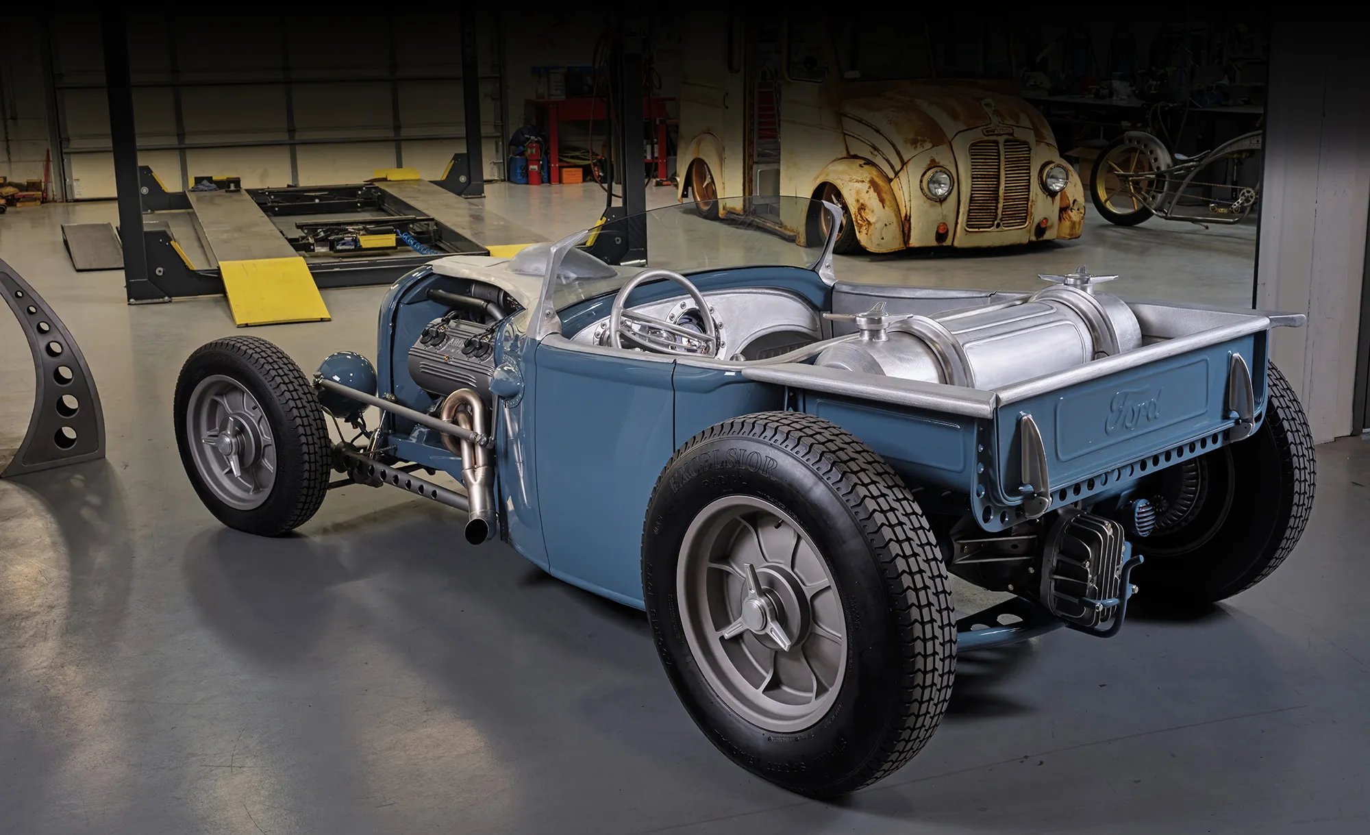 rear of a ’31 Ford roadster in a garage