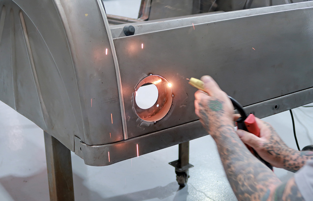 bucket being tack welded into place