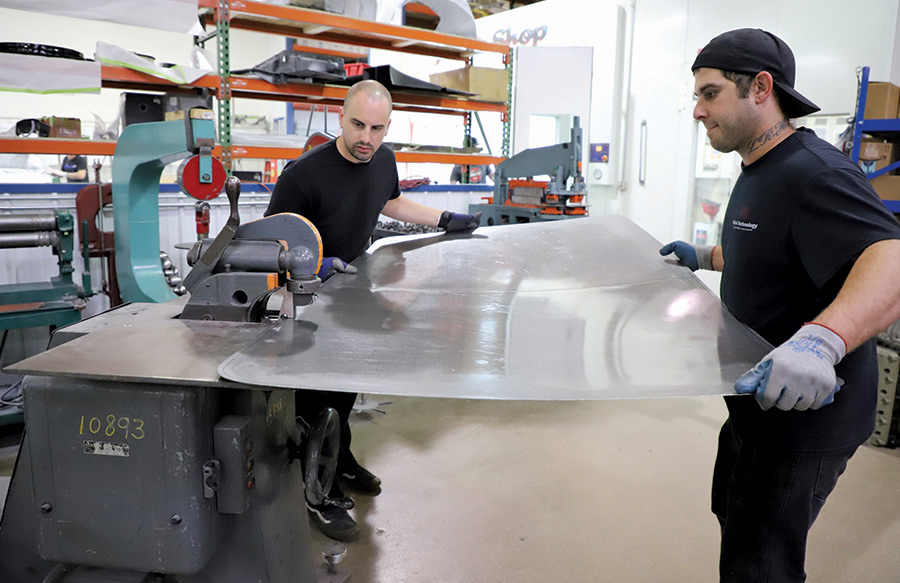 ERCO Machine being used to turn a 1/2-inch flange around the panel’s perimeter