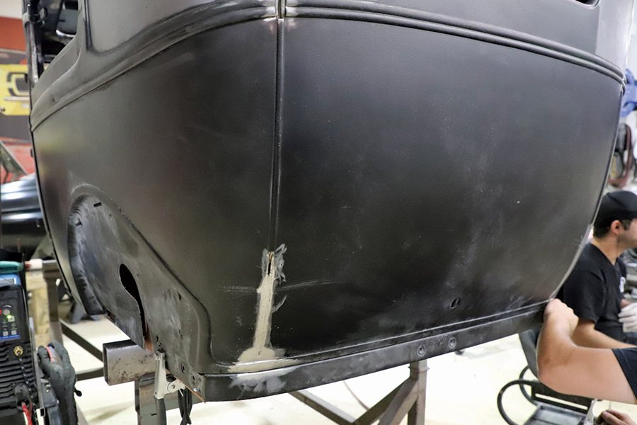 filled vertical beads on the rear body panel