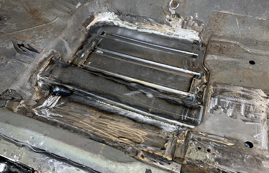 basic installation of one of the connectors linked to the front and rear framerails and the perimeter welded to the floor