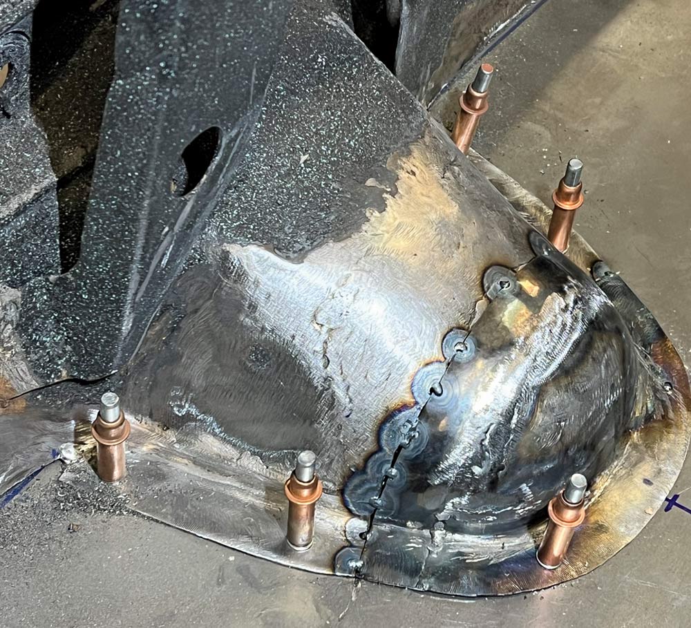 The filler tunnel is repositioned in its proper location with some careful cutting and fitting