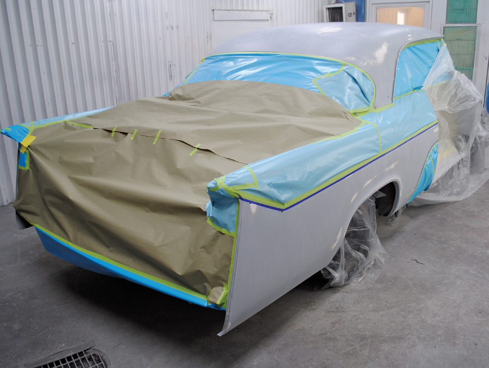Here, the top and flanks of the body have been sprayed with the pearl white basecoat, a much bolder finish than the original