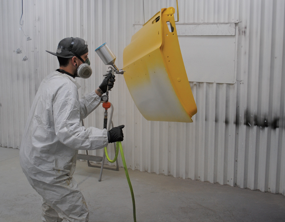 With the paint booth temperature in the 70- to 75-degree range, Tate shot the color coats