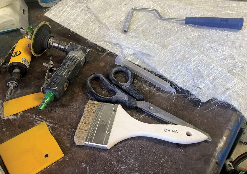 fiberglass cut into different sizes laying on workbench