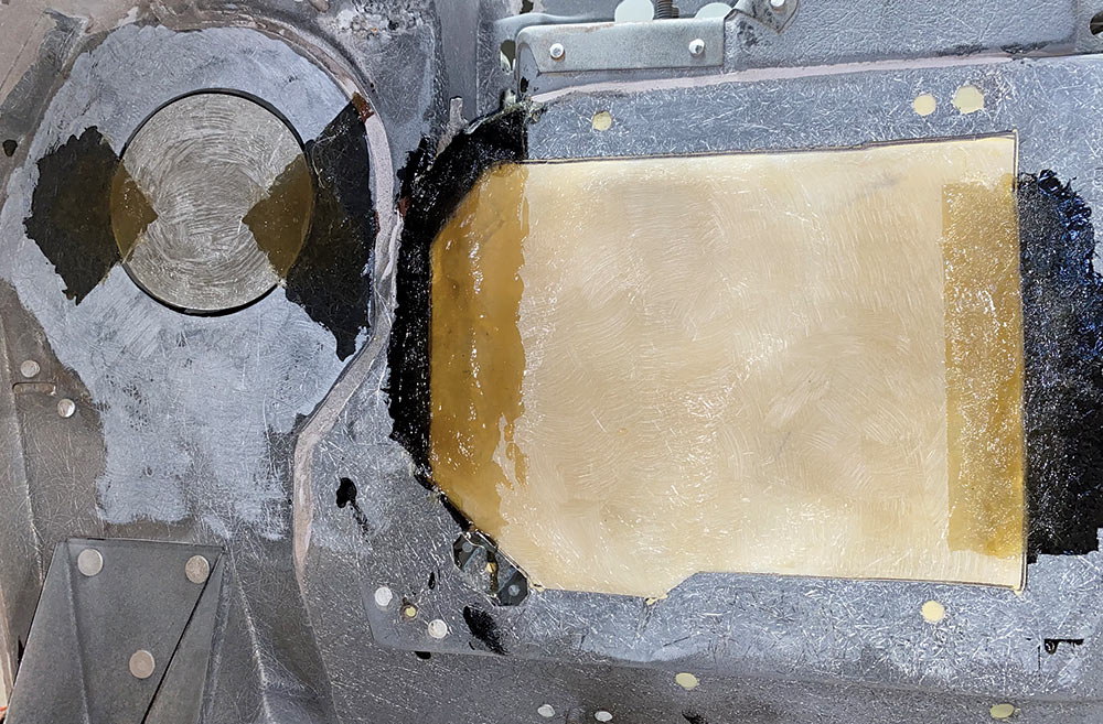 extra resin painted on edges of fiberglass to secure it in place 