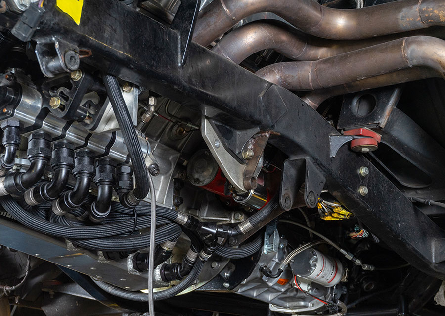 Detailed shot of the custom fuel and ignition lines beneath the 1955 Chevrolet Bel Air gasser