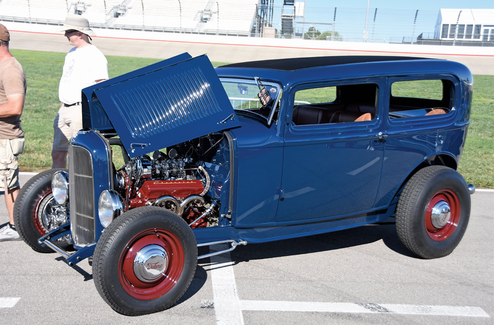 blue car at a car show