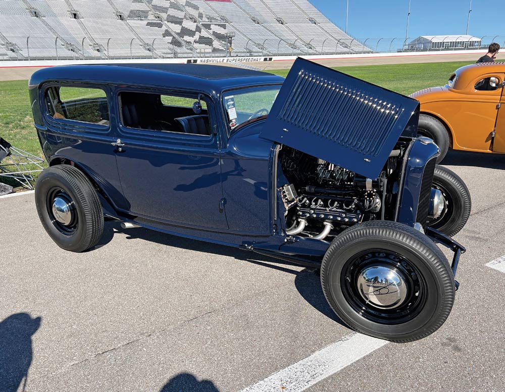 blue car at a car show