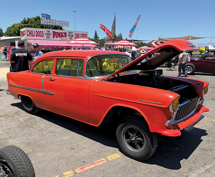 maroon 1932 Ford Roadster with a flathead V8 engine, sitting low on custom tires