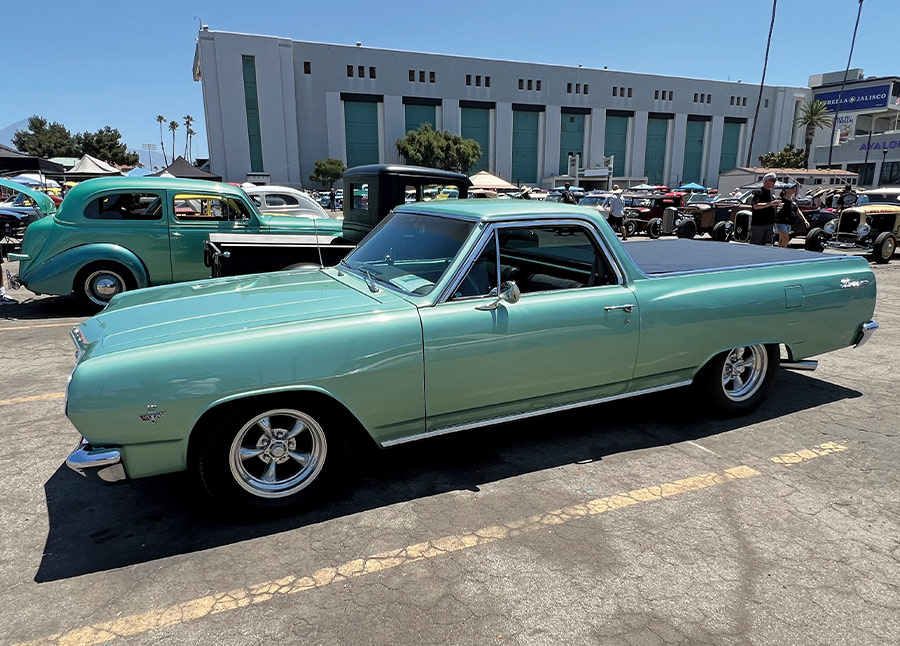 mint green 1965 Chevrolet El Camino with polished five-spoke wheels