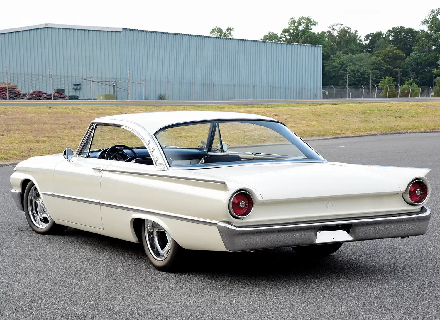 Close-up of chrome wheel on 1961 Ford Galaxie Starliner, equipped with Wilwood disc brakes