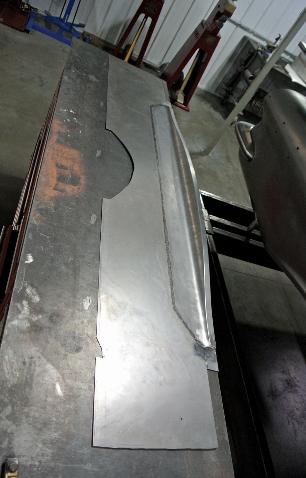 top center firewall welded to a larger flat pane