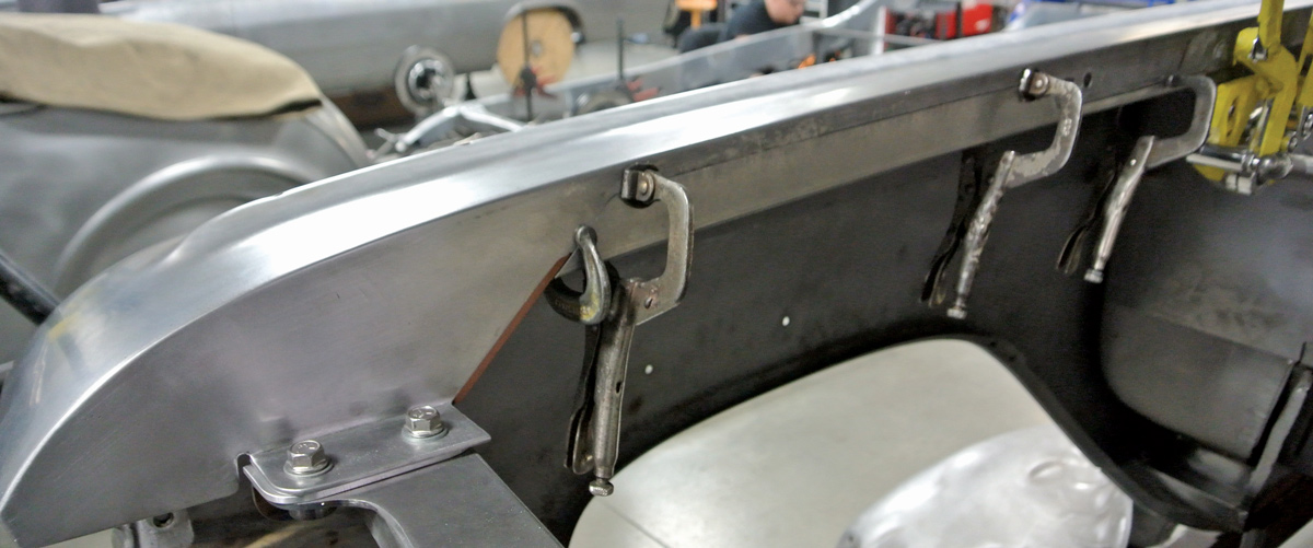 core support is bolted to the fenders