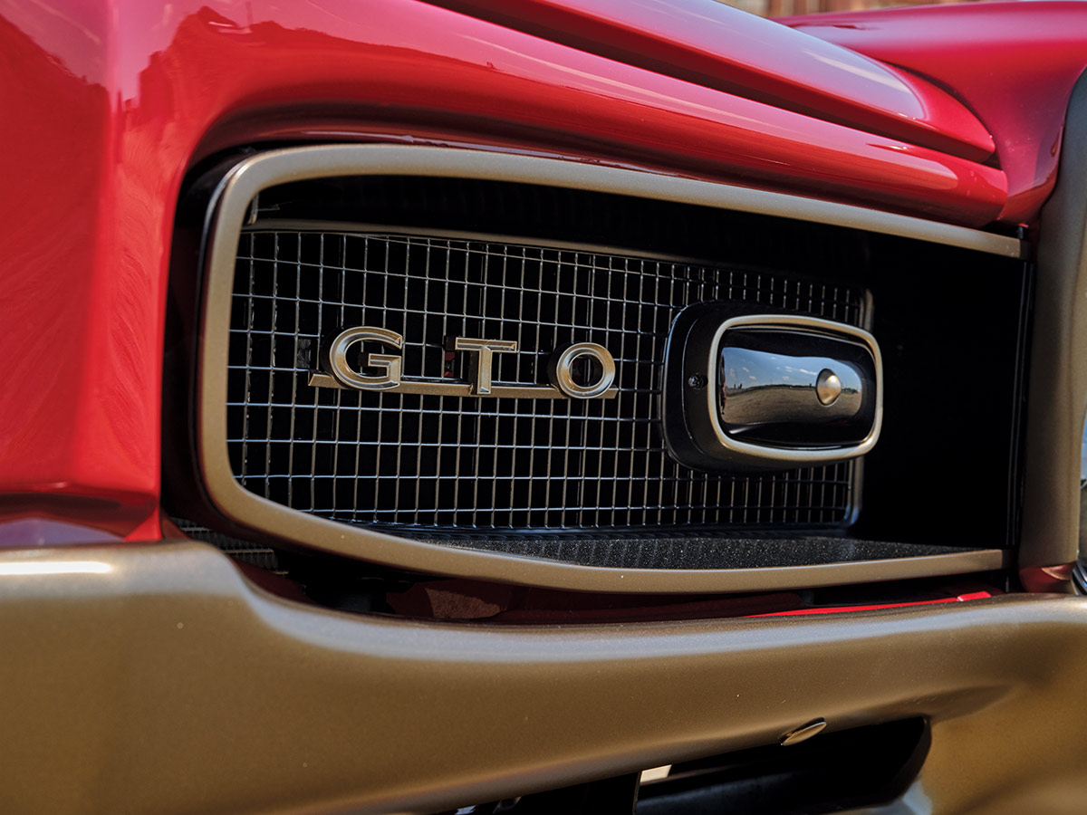 close up of the front grille and GTO lettering on a 1966 Pontiac